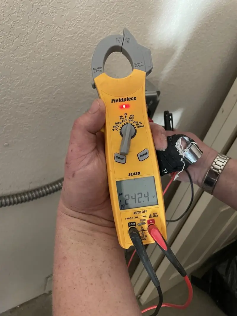 Voltage testing with clamp meter during Whole House Surge Protector in McCandless